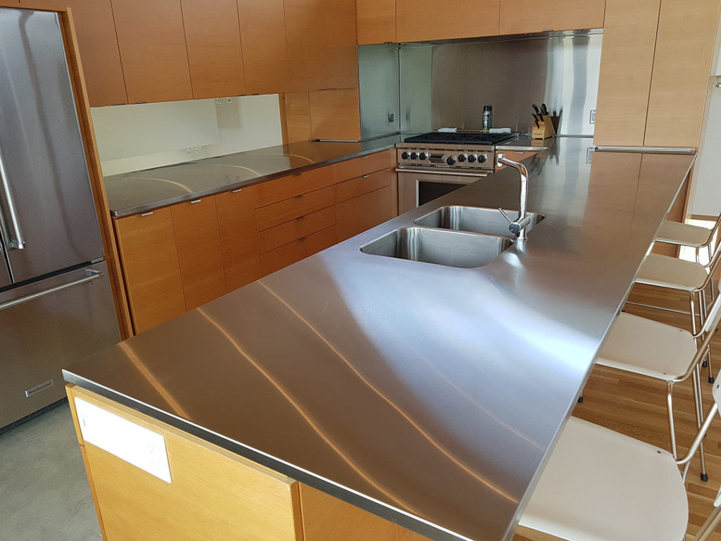 stainless steel kitchen island with sink